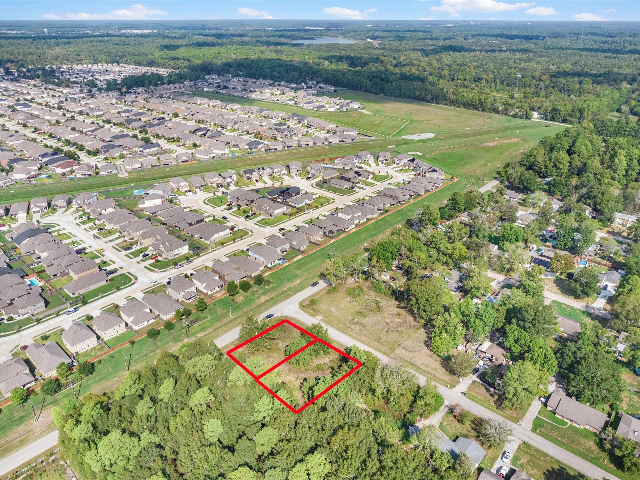 97804 River Ridge Conroe, TX 77385 - Photo 3 of 4 a view of a city