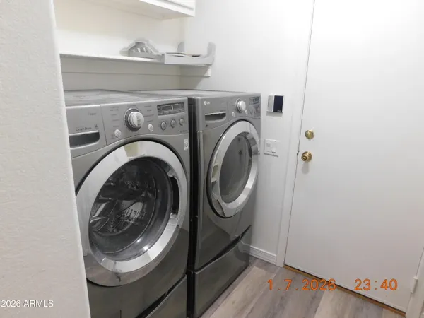 a utility room with dryer and washer