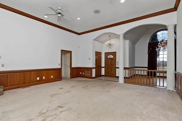 a view of a room with a flat screen tv