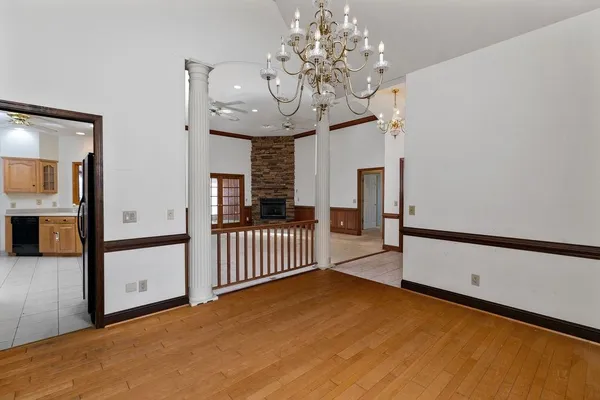 a kitchen with stainless steel appliances granite countertop a stove and a microwave