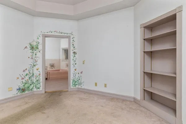 a bathroom with a sink vanity and mirror