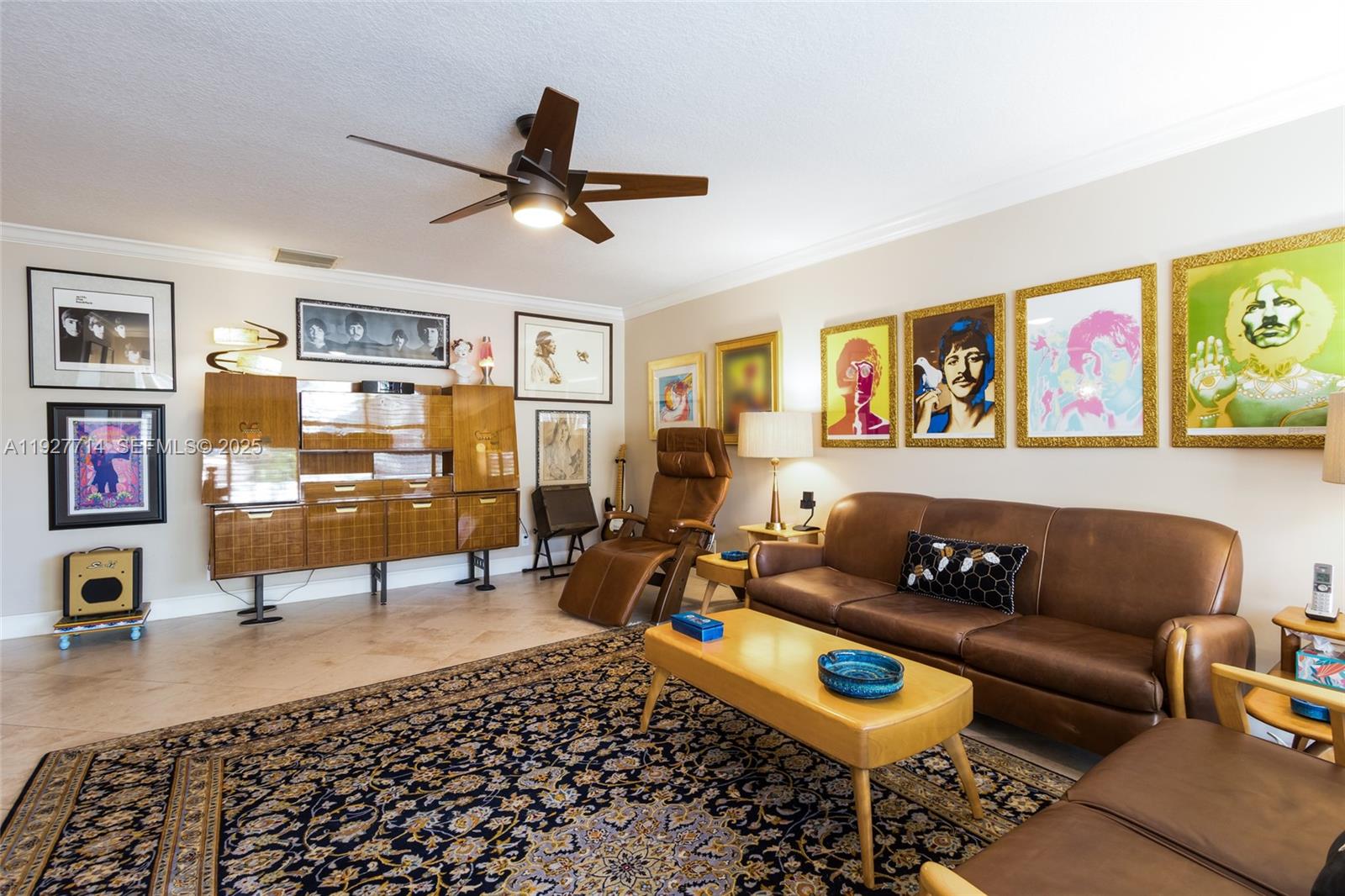 500 Bonnie Brae Way, Unit 17 Hollywood, FL 33021 - Photo 3 of 32 a living room with furniture and a rug