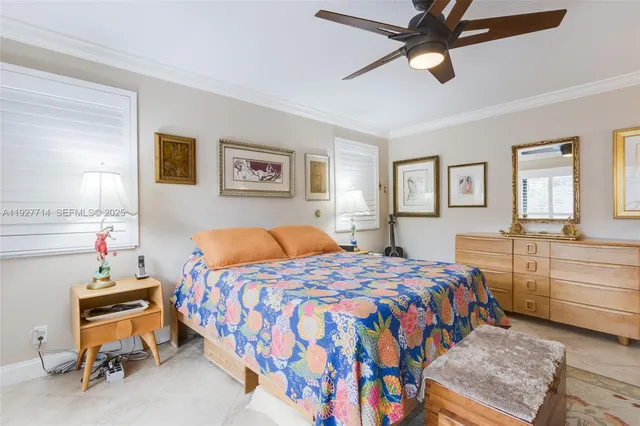 a bedroom with a bed and furniture