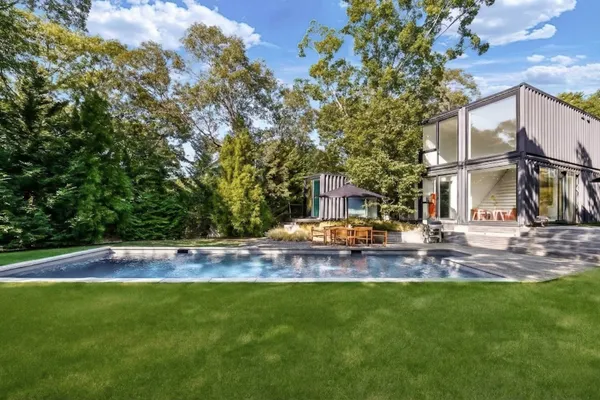 a view of swimming pool with a yard