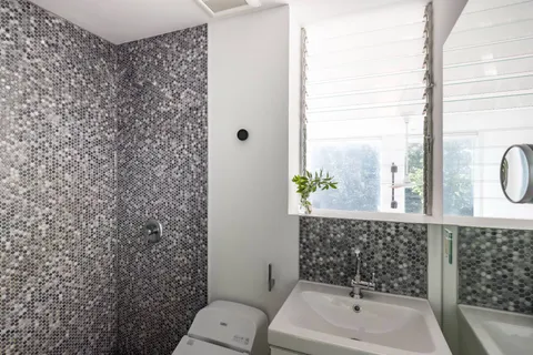 a bathroom with a sink and toilet