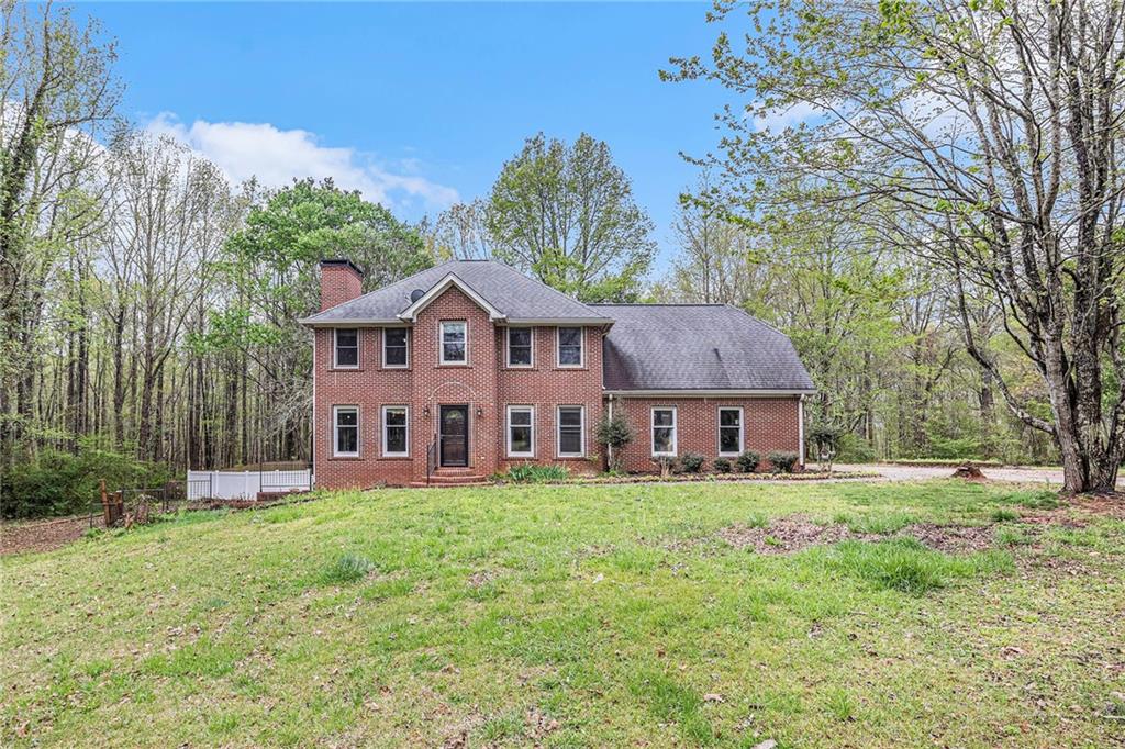 488 McBrayer Road Buchanan, GA 30113 - Photo 1 of 1 a house view with a garden space