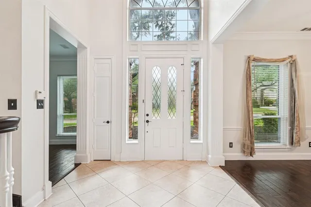 a view of a bathroom with a window and a bath tub