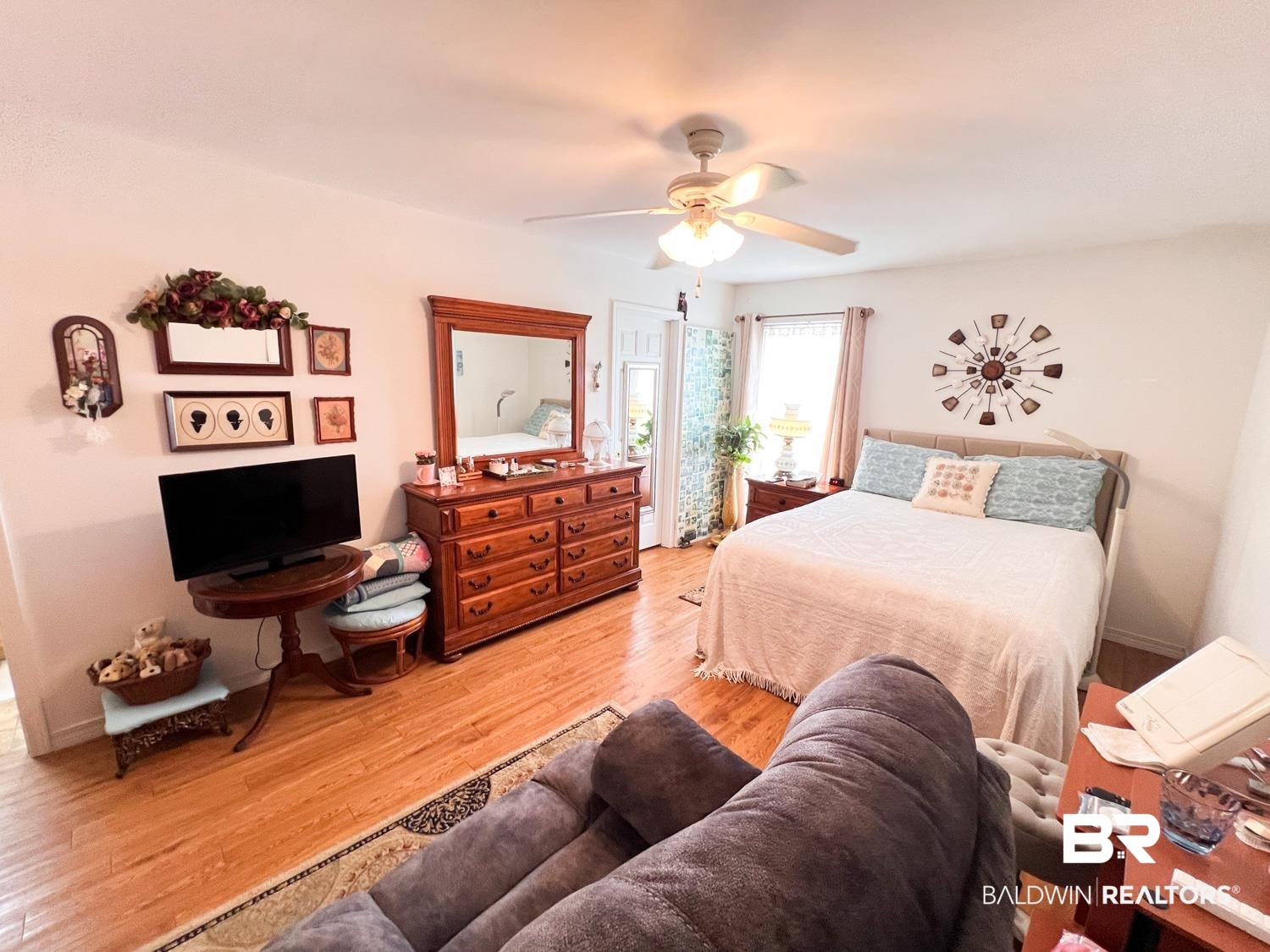 16690 Plum Court Loxley, AL 36551 - Photo 7 of 30 Bedroom with ceiling fan and wood-type flooring