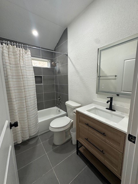 1311 East 35th Street Houston, TX 77022 - Photo 8 of 12 a bathroom with a toilet a sink a shower and mirror