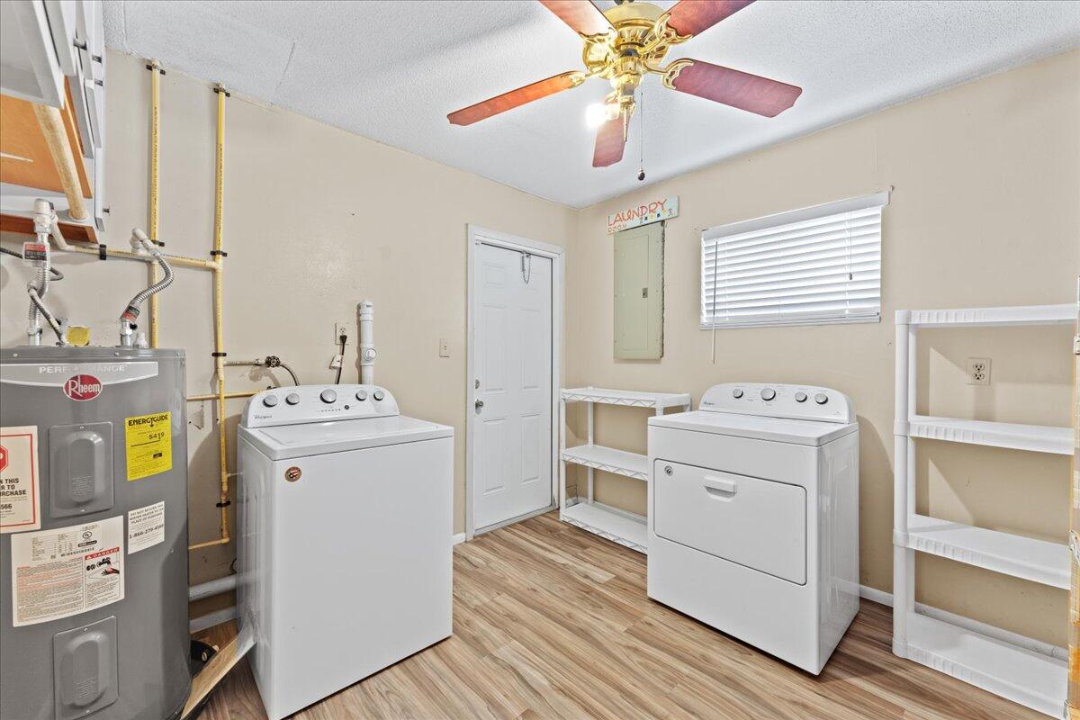 2199 Fatzler Road Melbourne, FL 32935 - Photo 13 of 23 a utility room with dryer and washer