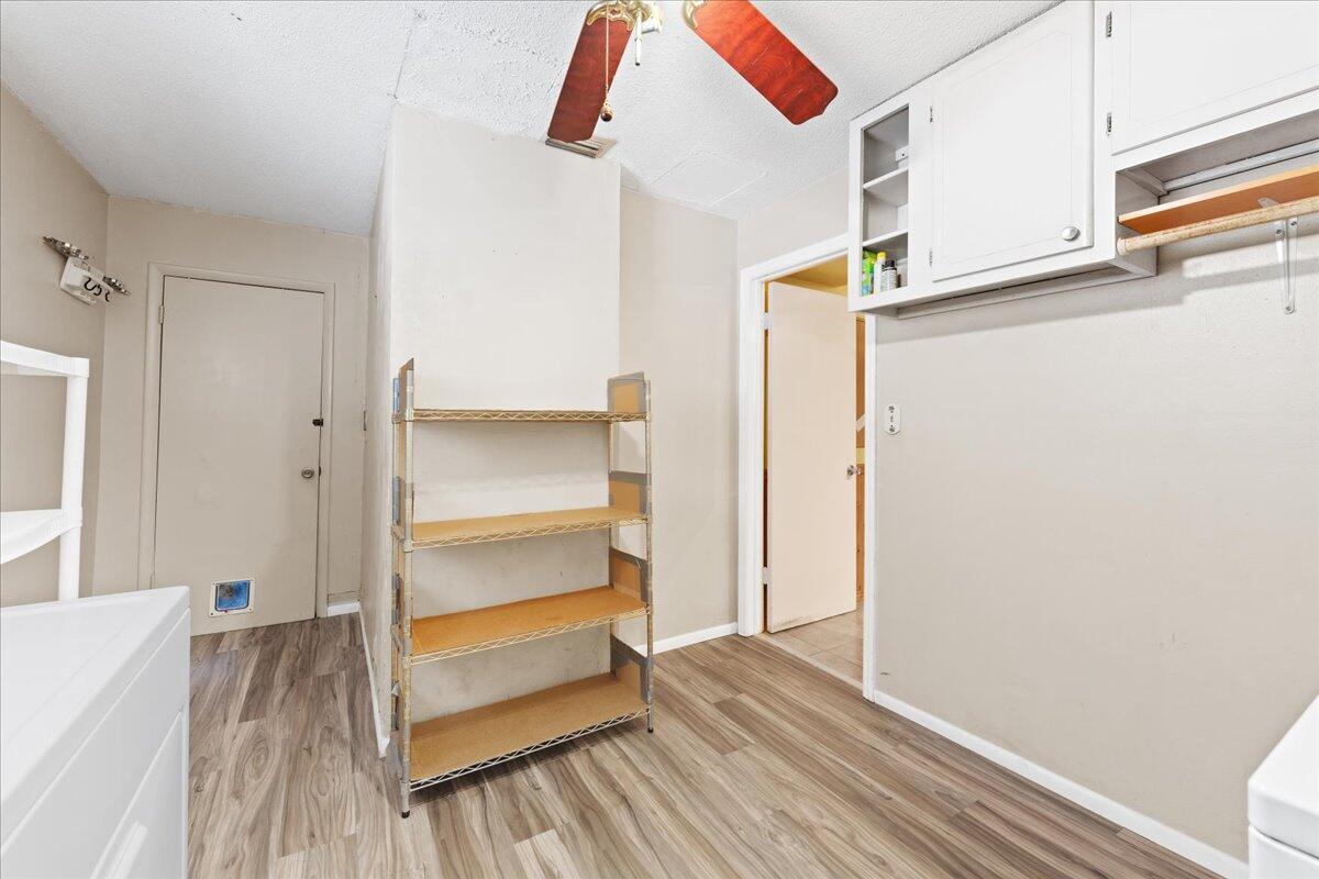 2199 Fatzler Road Melbourne, FL 32935 - Photo 14 of 23 a view of walk in closet with empty racks