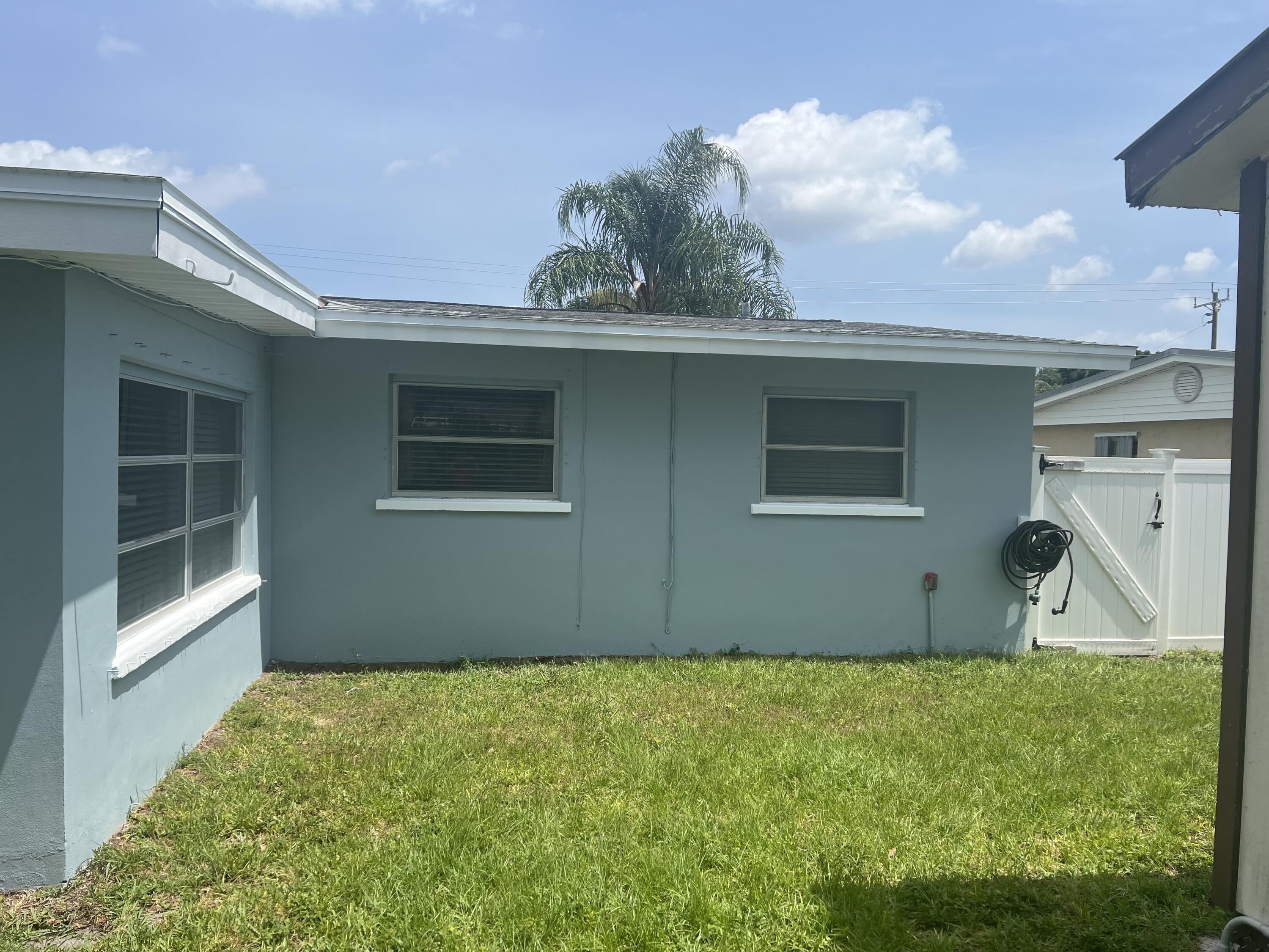 2199 Fatzler Road Melbourne, FL 32935 - Photo 22 of 23 a view of a backyard