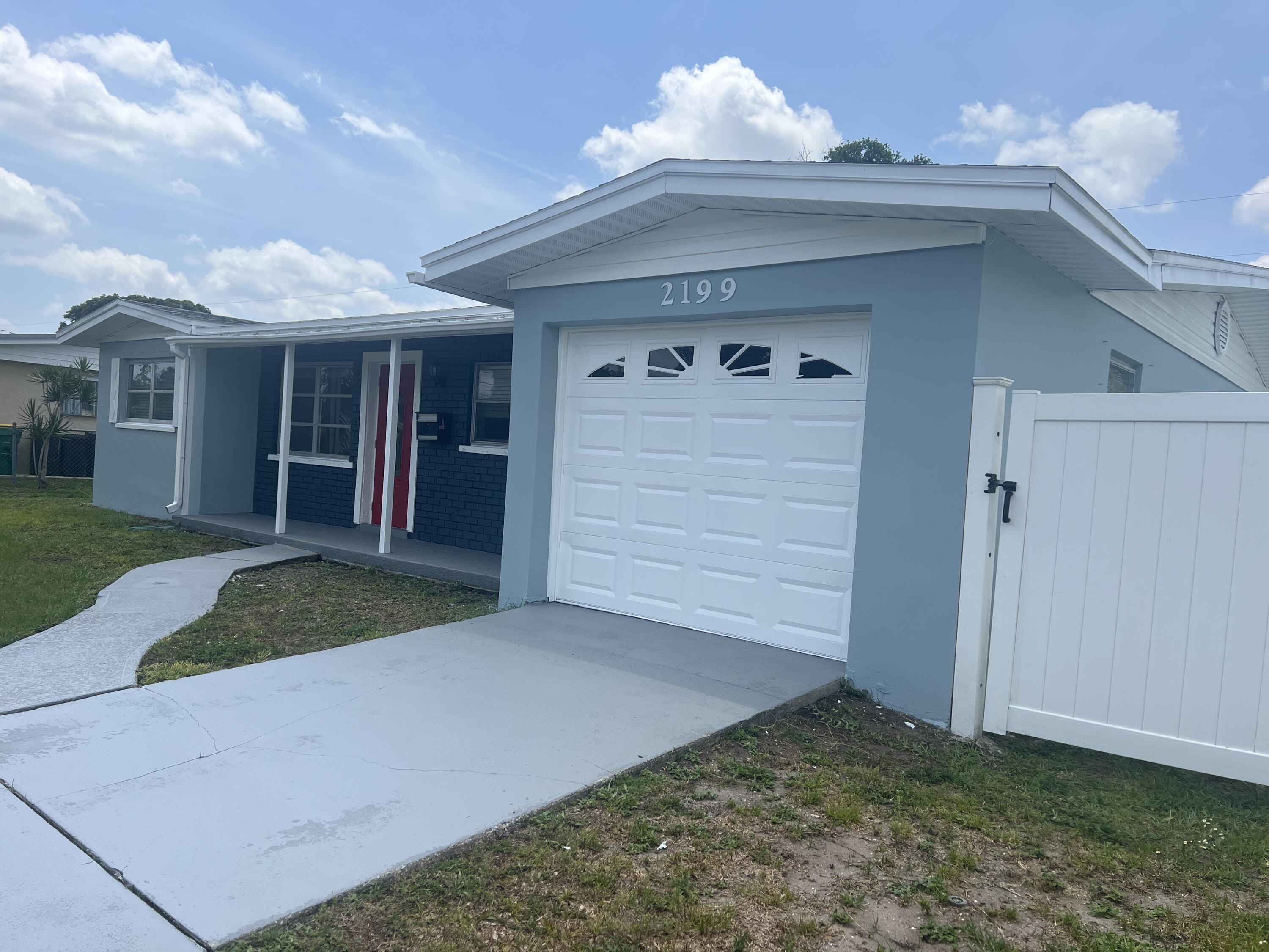 2199 Fatzler Road Melbourne, FL 32935 - Photo 4 of 23 a view of a house with a porch