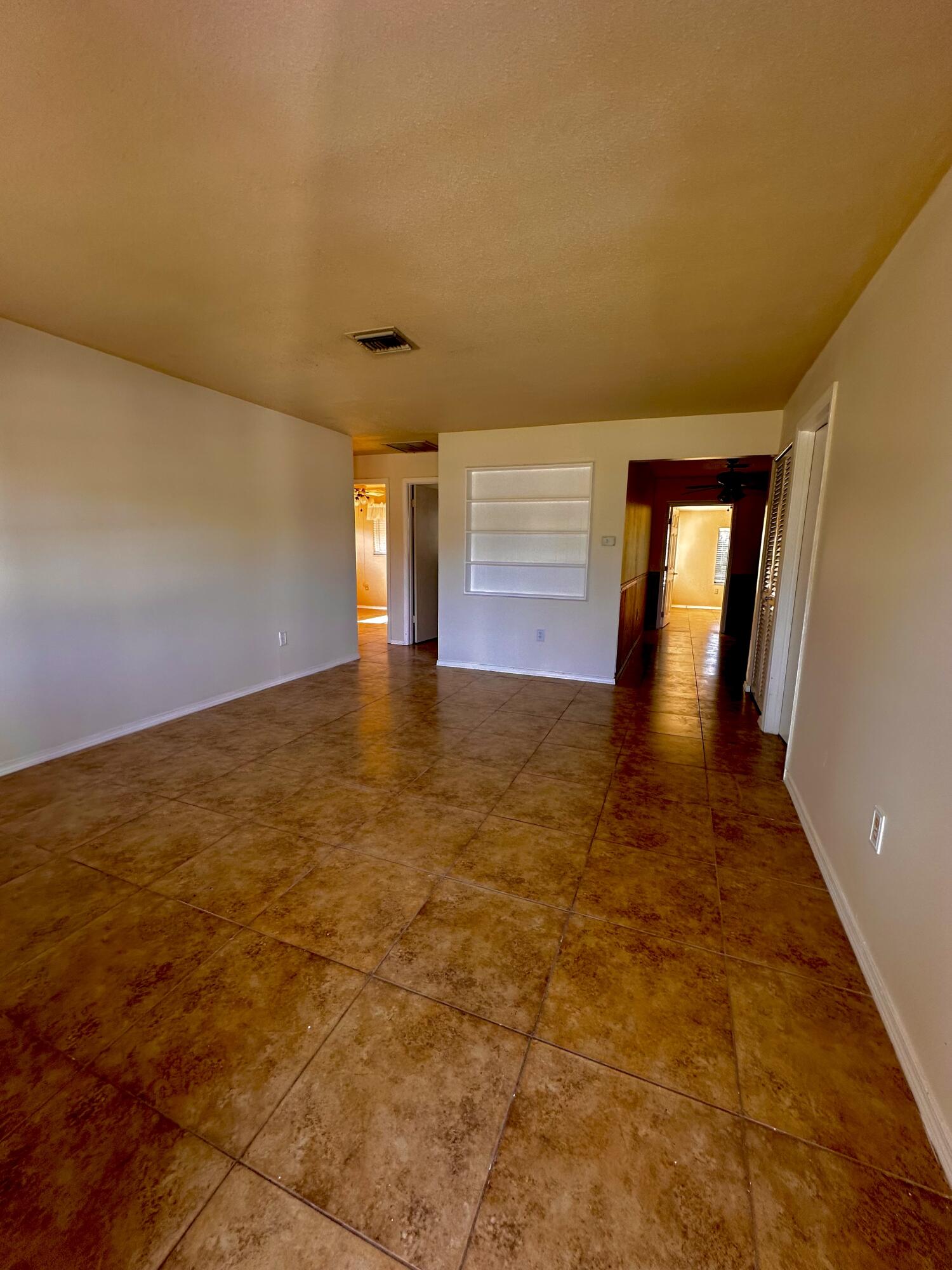 2199 Fatzler Road Melbourne, FL 32935 - Photo 6 of 23 a view of an empty room and window