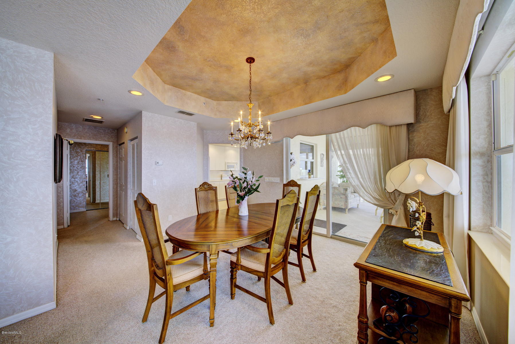 102 Riverside Drive, Unit 901 Cocoa, FL 32922 - Photo 16 of 54 Dining Room with Tray Ceiling