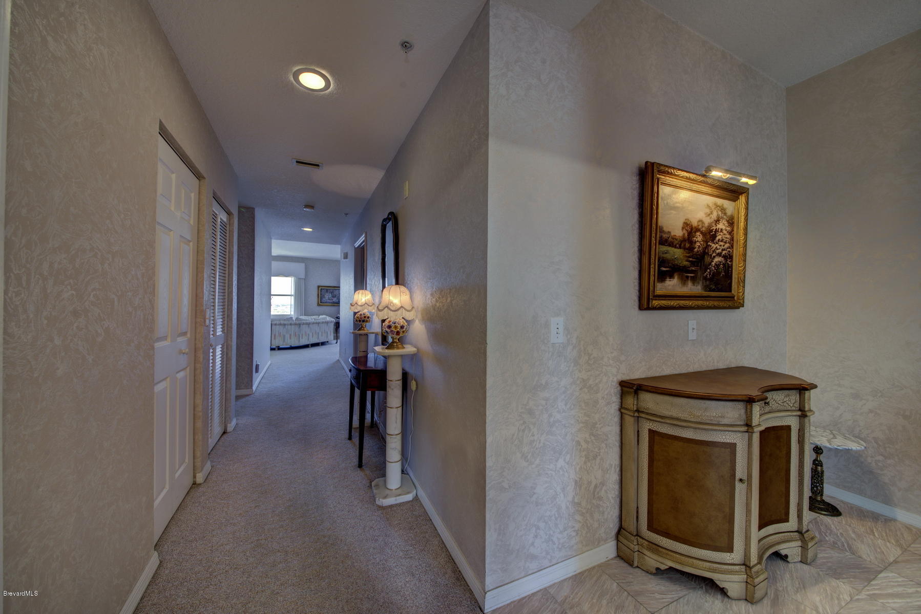 102 Riverside Drive, Unit 901 Cocoa, FL 32922 - Photo 7 of 54 Entry Hallway Closets
