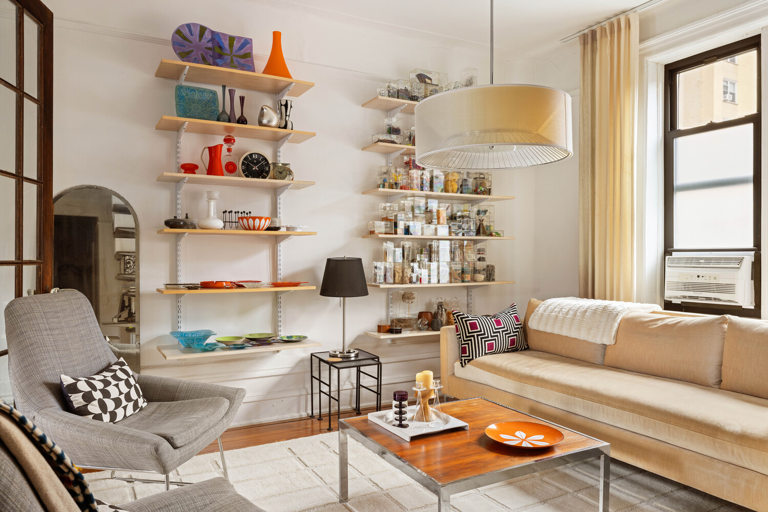 21 Butler Place, Unit 4E Brooklyn, NY 11238 - Photo 3 of 11 a living room with furniture and a window