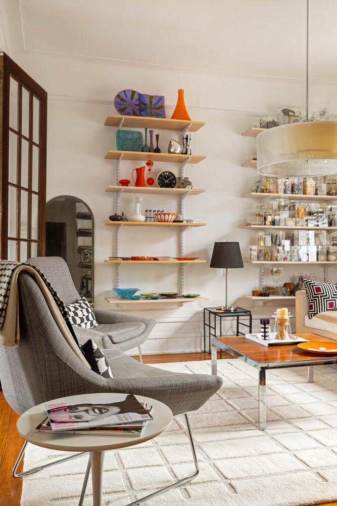 21 Butler Place, Unit 4E Brooklyn, NY 11238 - Photo 4 of 11 a outdoor space with lots of white furniture and a book shelf