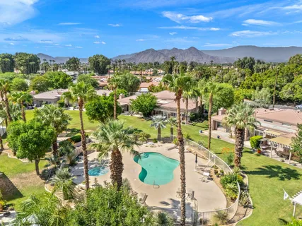 a view of a house with basketball court