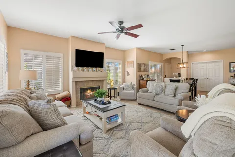 a kitchen with appliances a sink a counter top space and cabinets