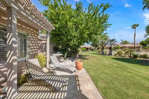 a view of a backyard with a patio