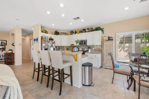 a view of a dining room with furniture