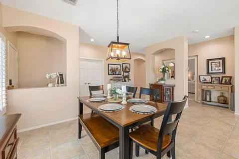 a bedroom with a bed and a dresser in it