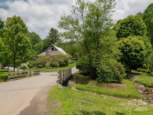 a view of a lake with a yard