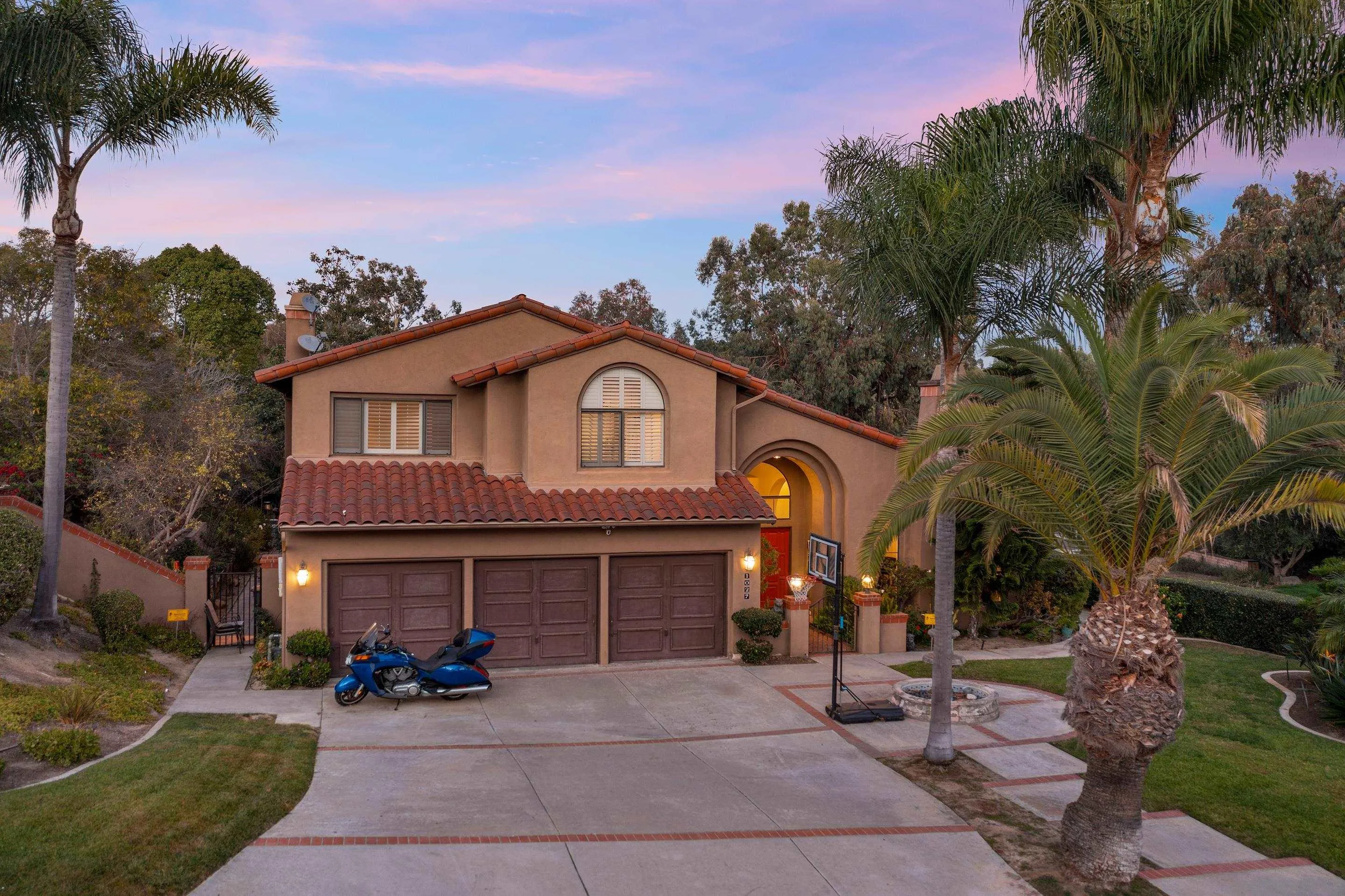 1027 Summer Holly Lane Encinitas, CA 92024 - Photo 1 of 29 a front view of a house with garden