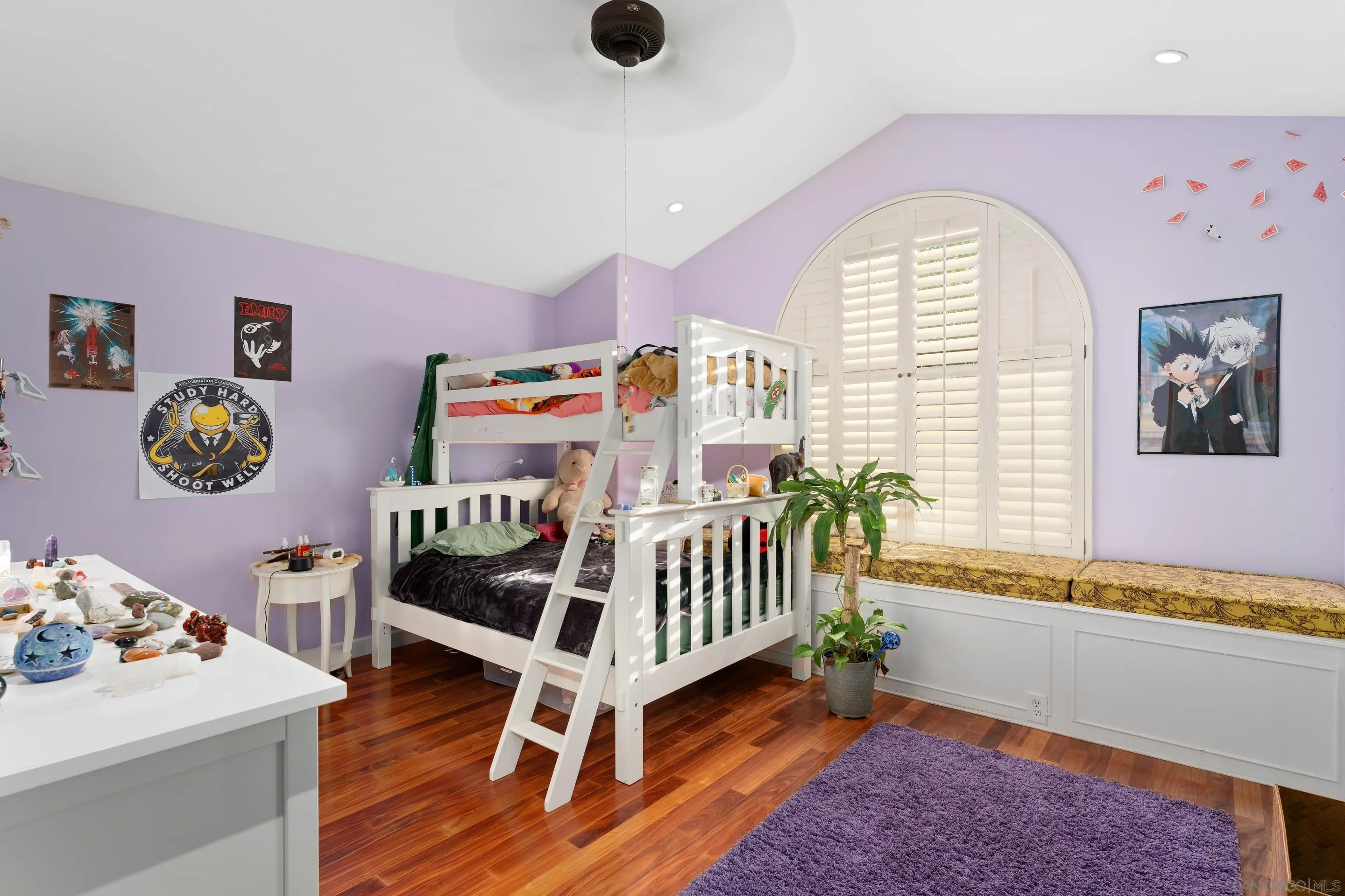 1027 Summer Holly Lane Encinitas, CA 92024 - Photo 19 of 29 a bedroom with furniture and a wooden floor