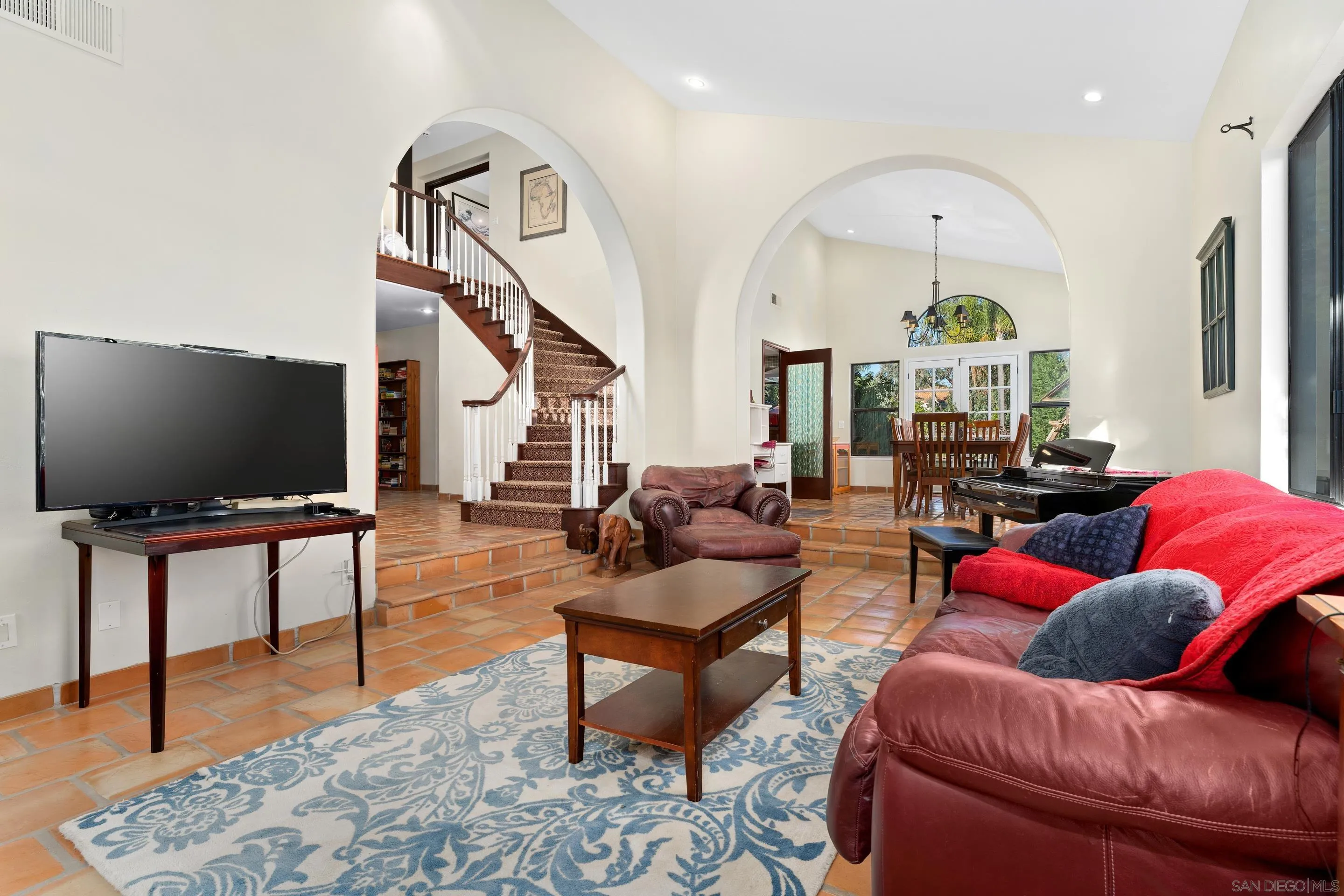 1027 Summer Holly Lane Encinitas, CA 92024 - Photo 8 of 29 a living room with furniture and a flat screen tv
