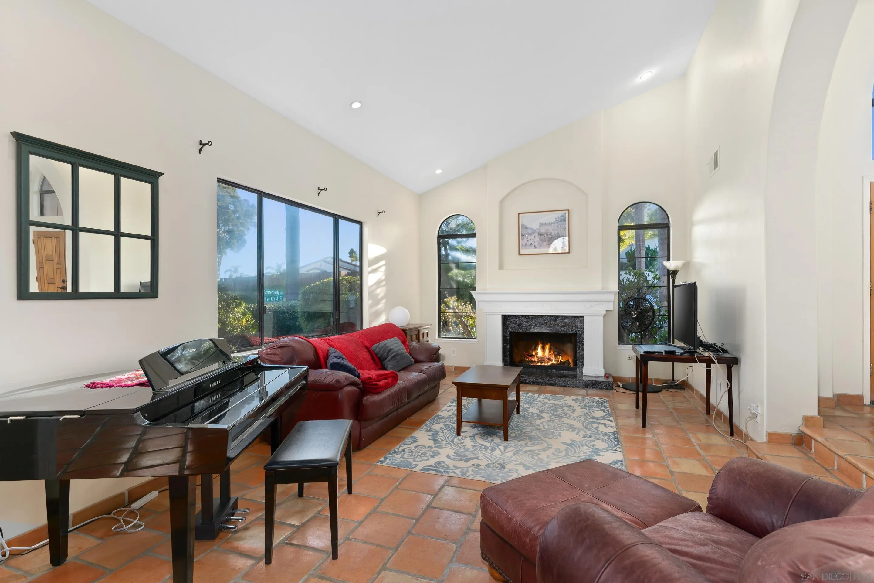 1027 Summer Holly Lane Encinitas, CA 92024 - Photo 9 of 29 a living room with furniture fireplace and window