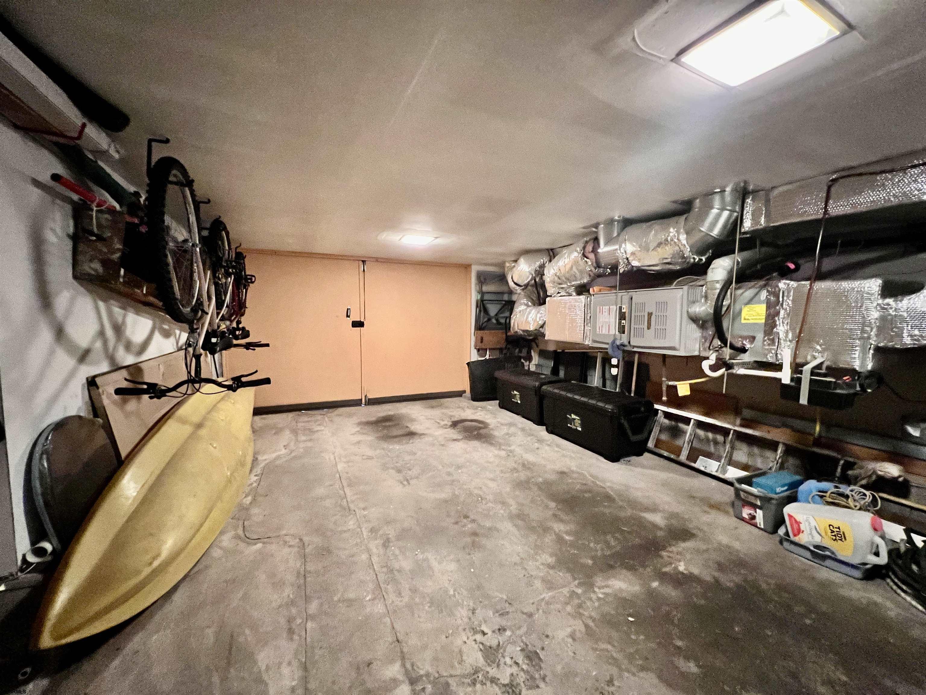 7 North Delavan Avenue, Unit MEMORIAL DAY LABOR DAY Margate City, NJ 08402 - Photo 59 of 60 a view of a room with gym equipment