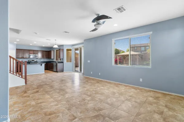 a view of kitchen with furniture and window