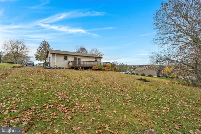 a view of a large body of water with a building in the background