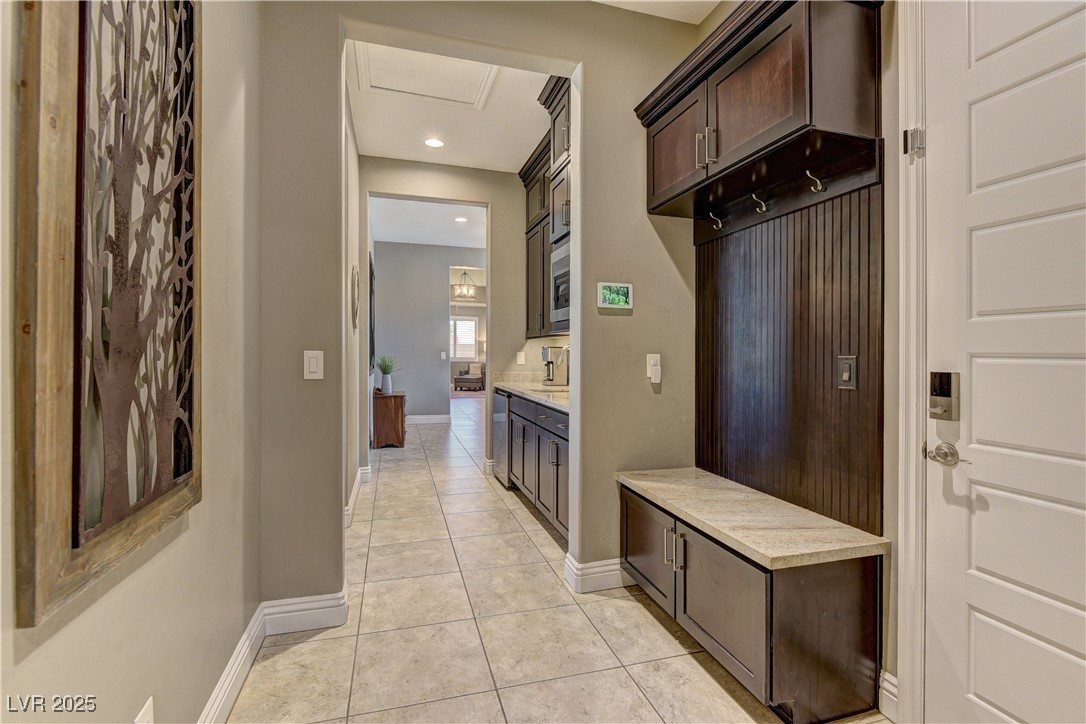 8411 South Cimarron Road Las Vegas, NV 89113 - Photo 27 of 46 Entrance to home from garage