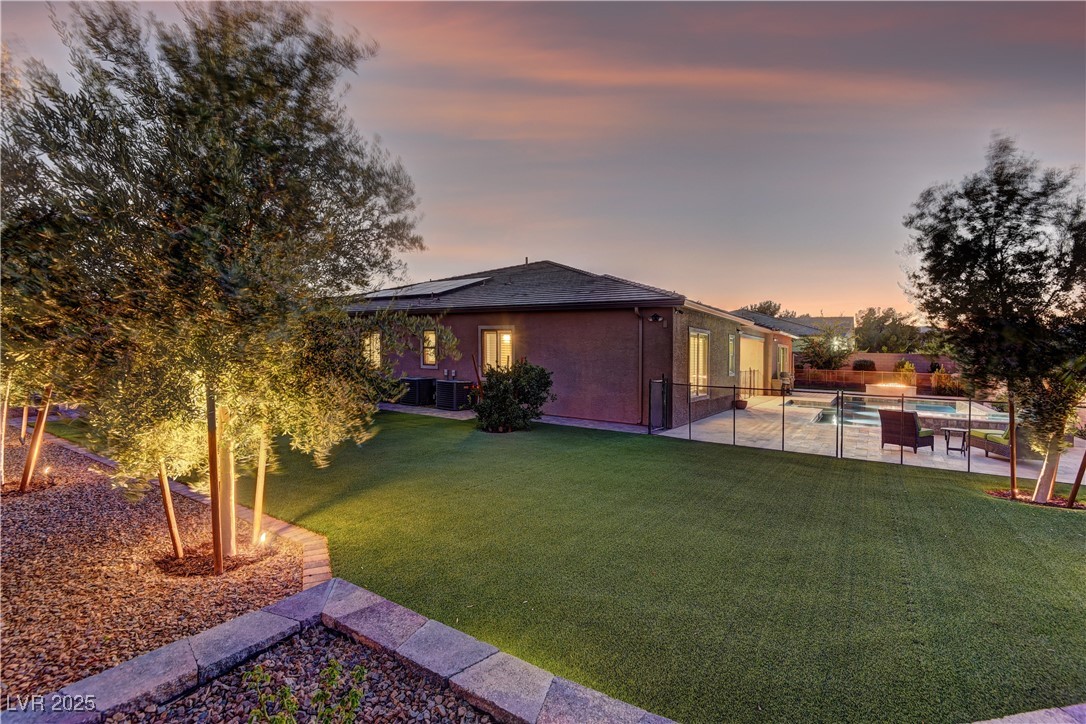 8411 South Cimarron Road Las Vegas, NV 89113 - Photo 33 of 46 Landscape lighting throughout