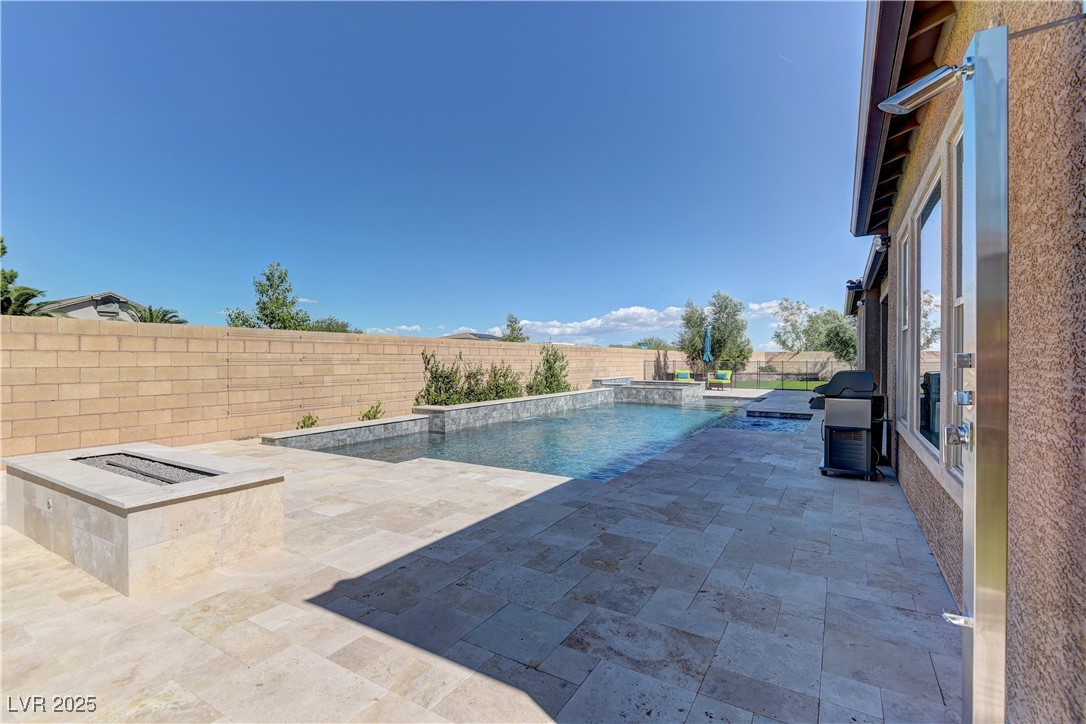 8411 South Cimarron Road Las Vegas, NV 89113 - Photo 44 of 46 Salt water pool and outdoor shower