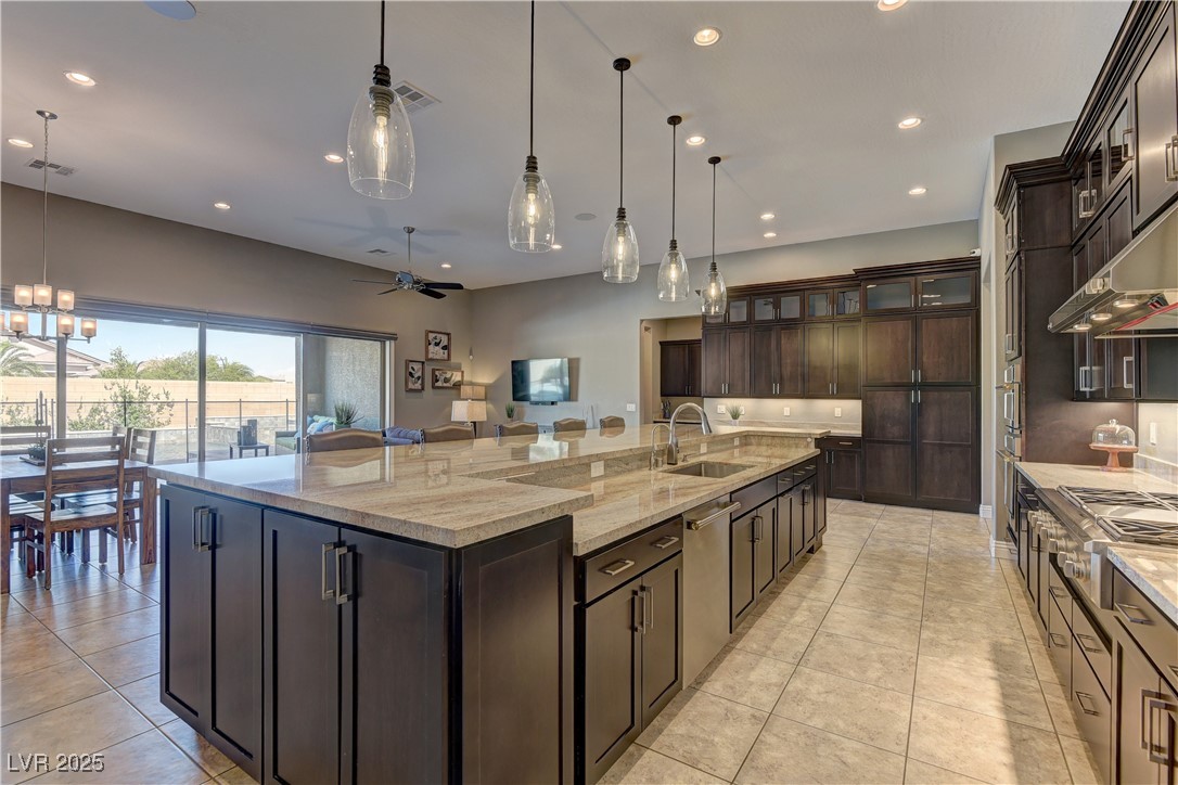 8411 South Cimarron Road Las Vegas, NV 89113 - Photo 5 of 46 Chef's kitchen with upgraded soft-close cabinetry