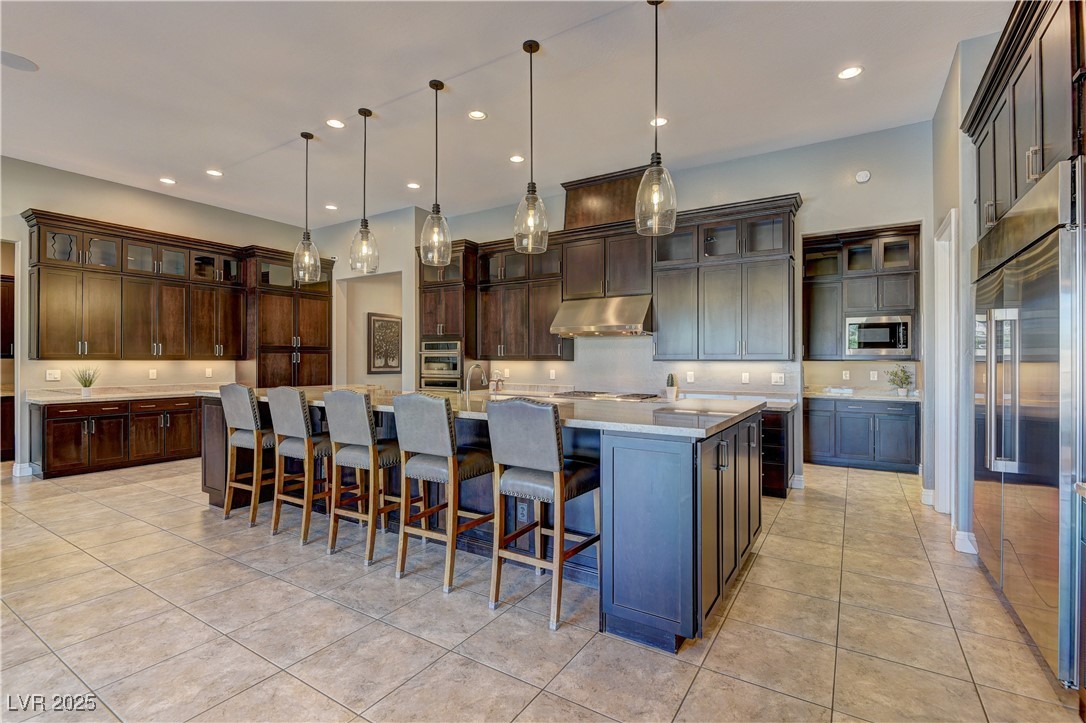 8411 South Cimarron Road Las Vegas, NV 89113 - Photo 7 of 46 Gorgeous kitchen with island seating