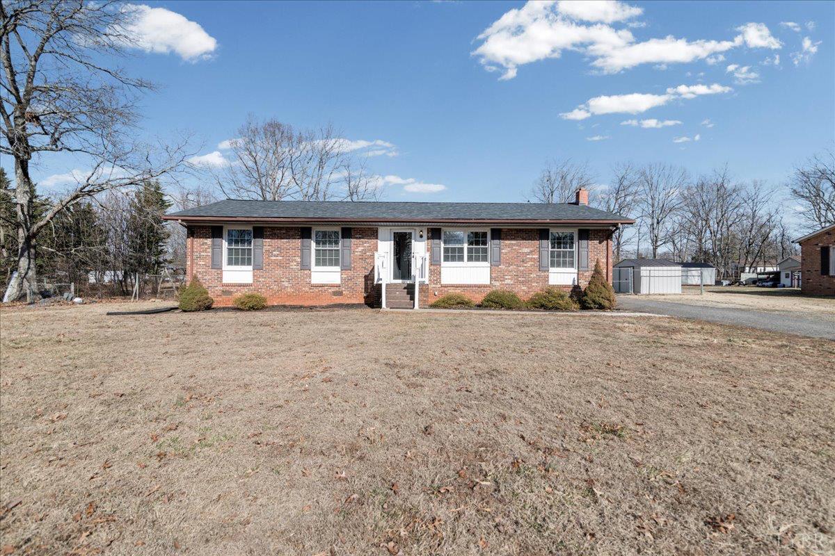 813 Doss Road Concord, VA 24538 - Photo 1 of 31 a front view of a house with a yard