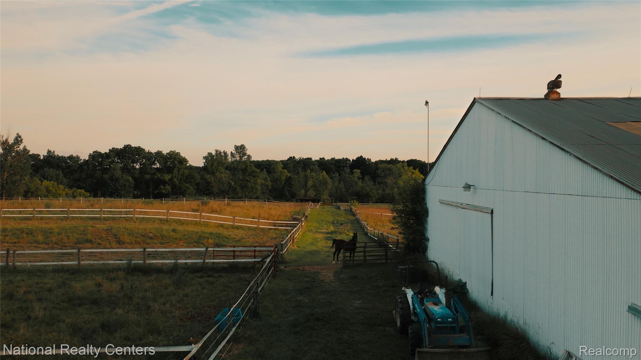 58191 8 Mile Road Northville, MI 48167 - Photo 47 of 57 Agricultural building with white corrugated siding and a metal roof