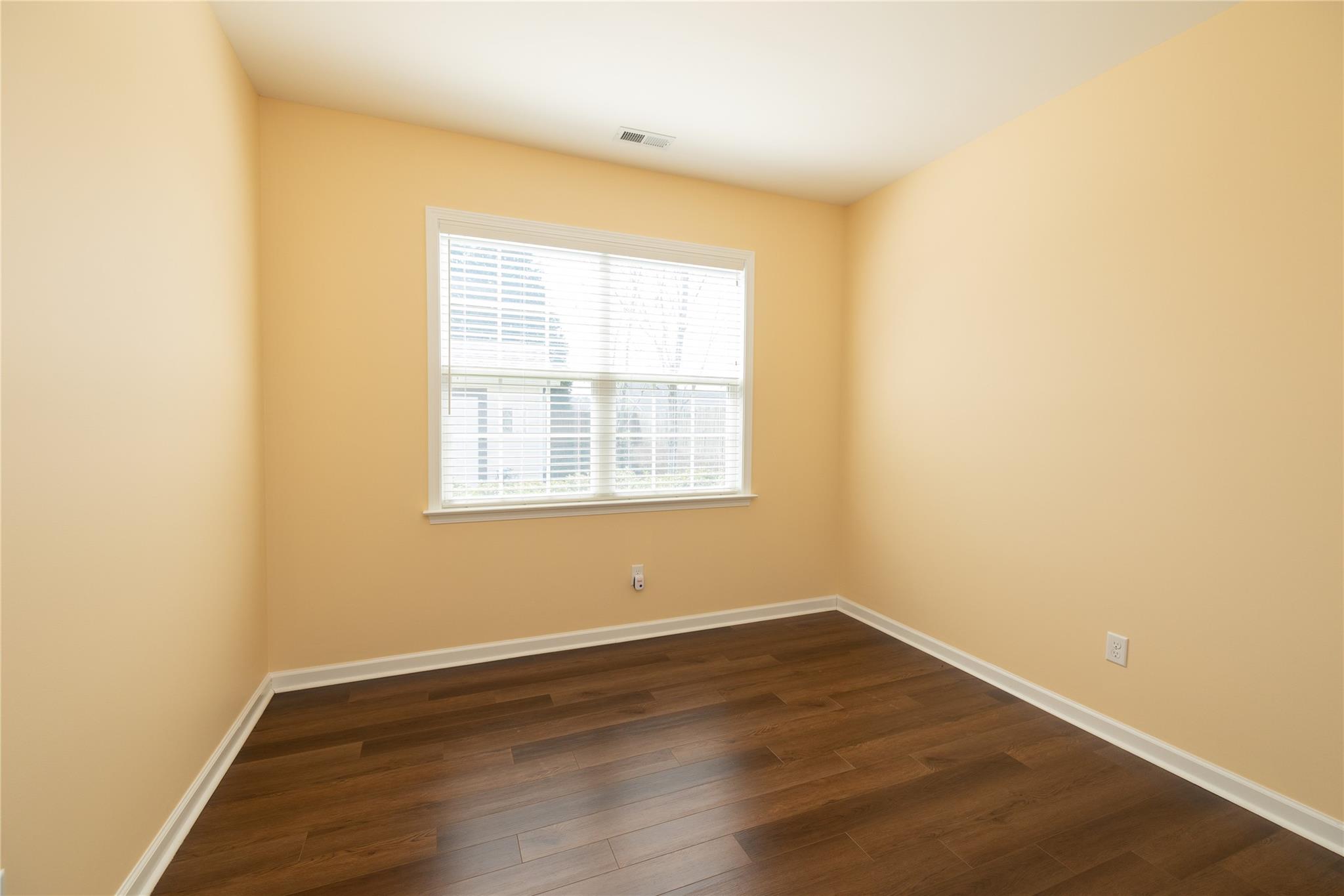 330 West Swift Creek Road Fletcher, NC 28732 - Photo 15 of 29 an empty room with wooden floor and windows