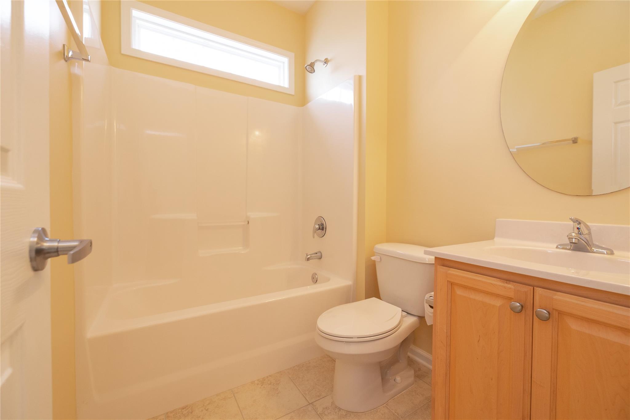 330 West Swift Creek Road Fletcher, NC 28732 - Photo 17 of 29 a bathroom with a toilet a sink and a bathtub