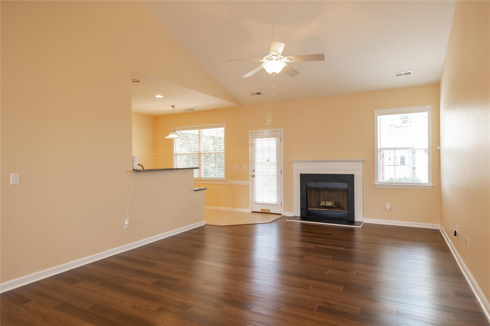 330 West Swift Creek Road Fletcher, NC 28732 - Photo 3 of 29 a view of an empty room with a fireplace and a window