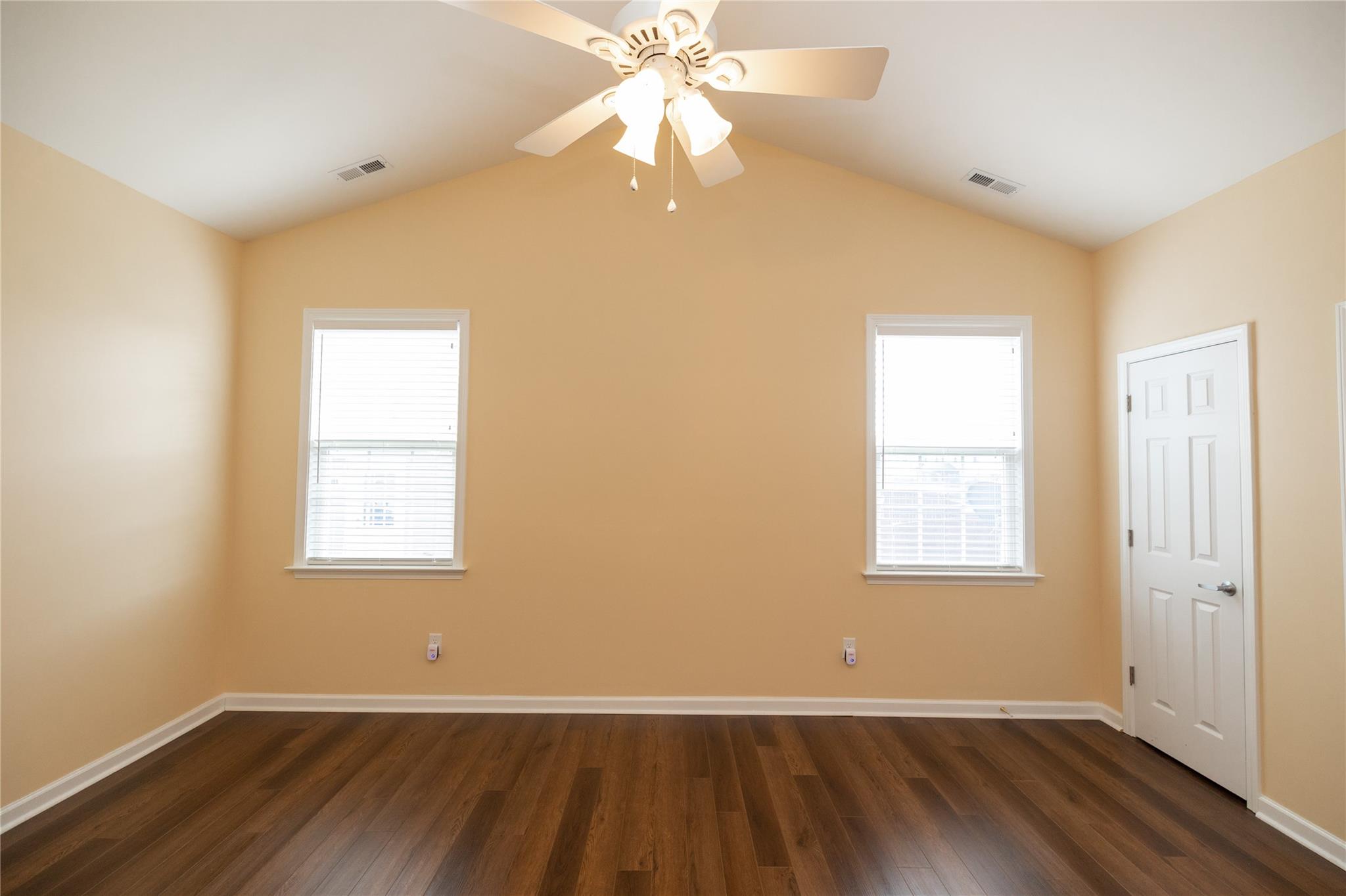 330 West Swift Creek Road Fletcher, NC 28732 - Photo 9 of 29 a view of an empty room with wooden floor and a window