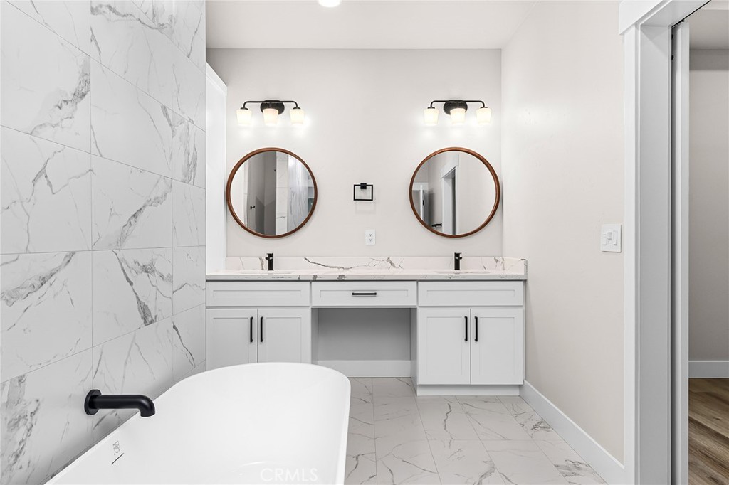 707 Madrone Way Paradise, CA 95969 - Photo 16 of 47 a bathroom with a toilet sink and mirror