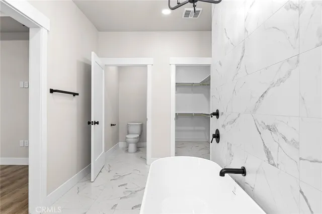 a bathroom with a sink and toilet