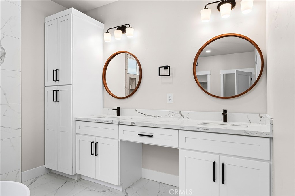 707 Madrone Way Paradise, CA 95969 - Photo 19 of 47 a bathroom with a sink and a mirror