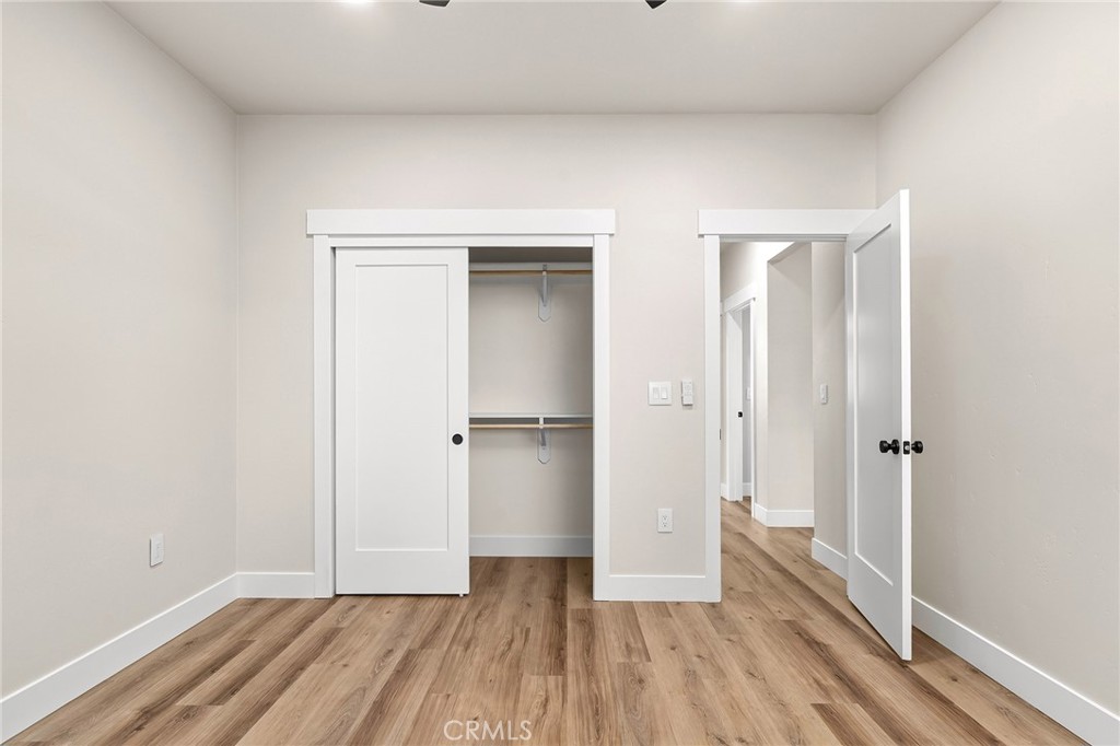707 Madrone Way Paradise, CA 95969 - Photo 23 of 47 a view of a hallway with wooden floor